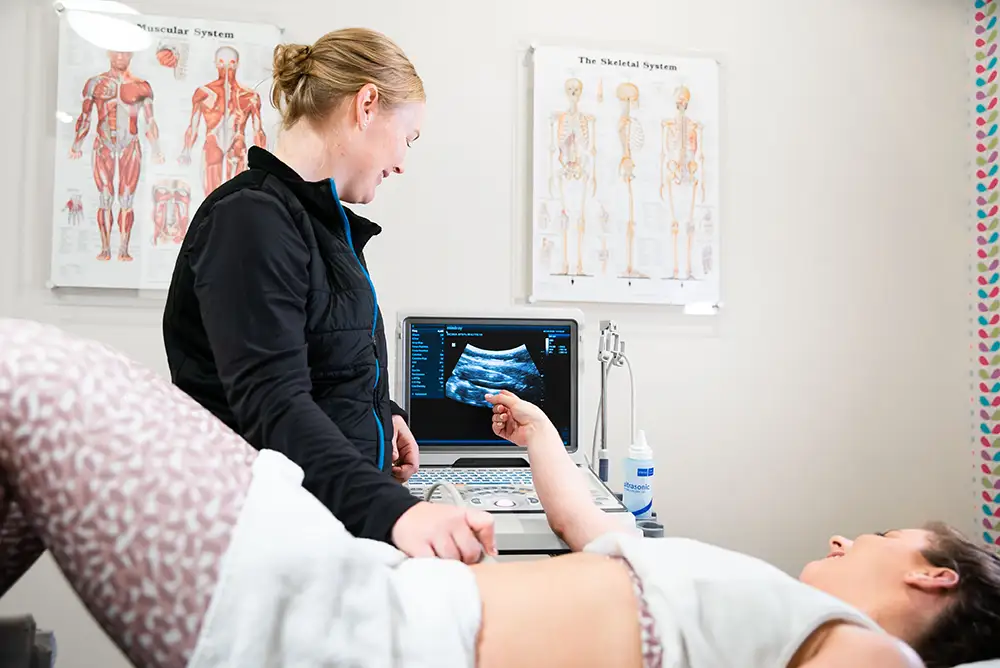 Women's Health Physiotherapist 1 ultrasound being used as a diagnosis tool on patient